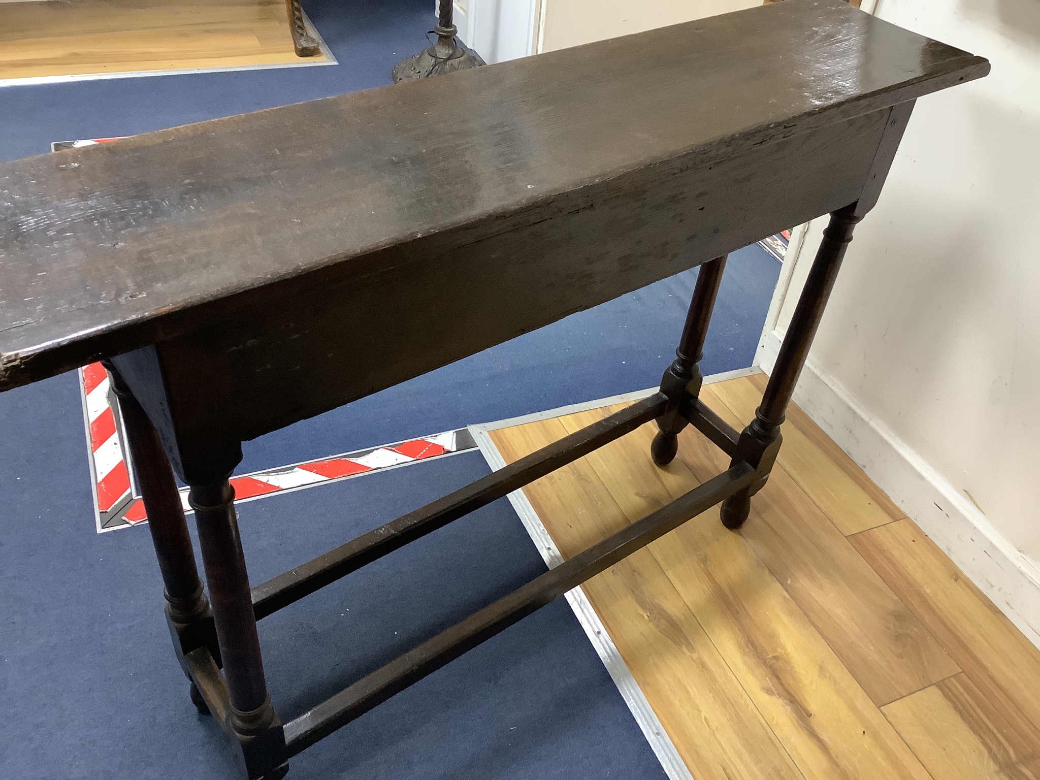 A narrow oak rectangular side table